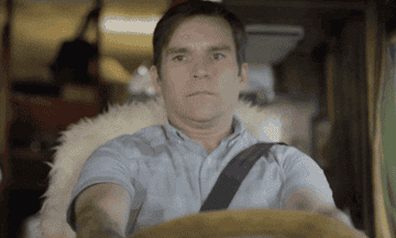 man driving a car recklessly