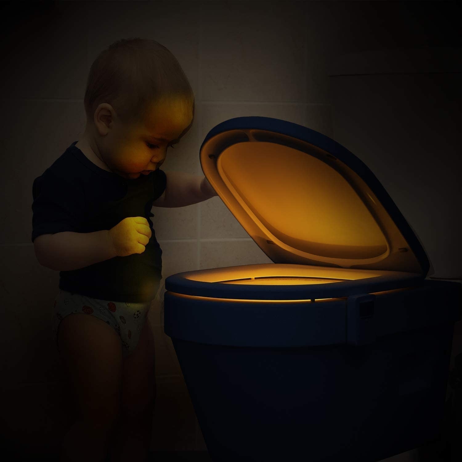 kid opening toilet with light