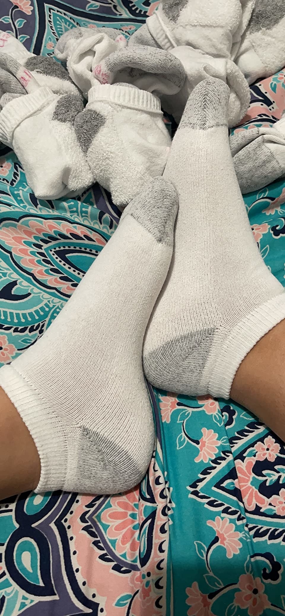 Reviewer wearing white socks