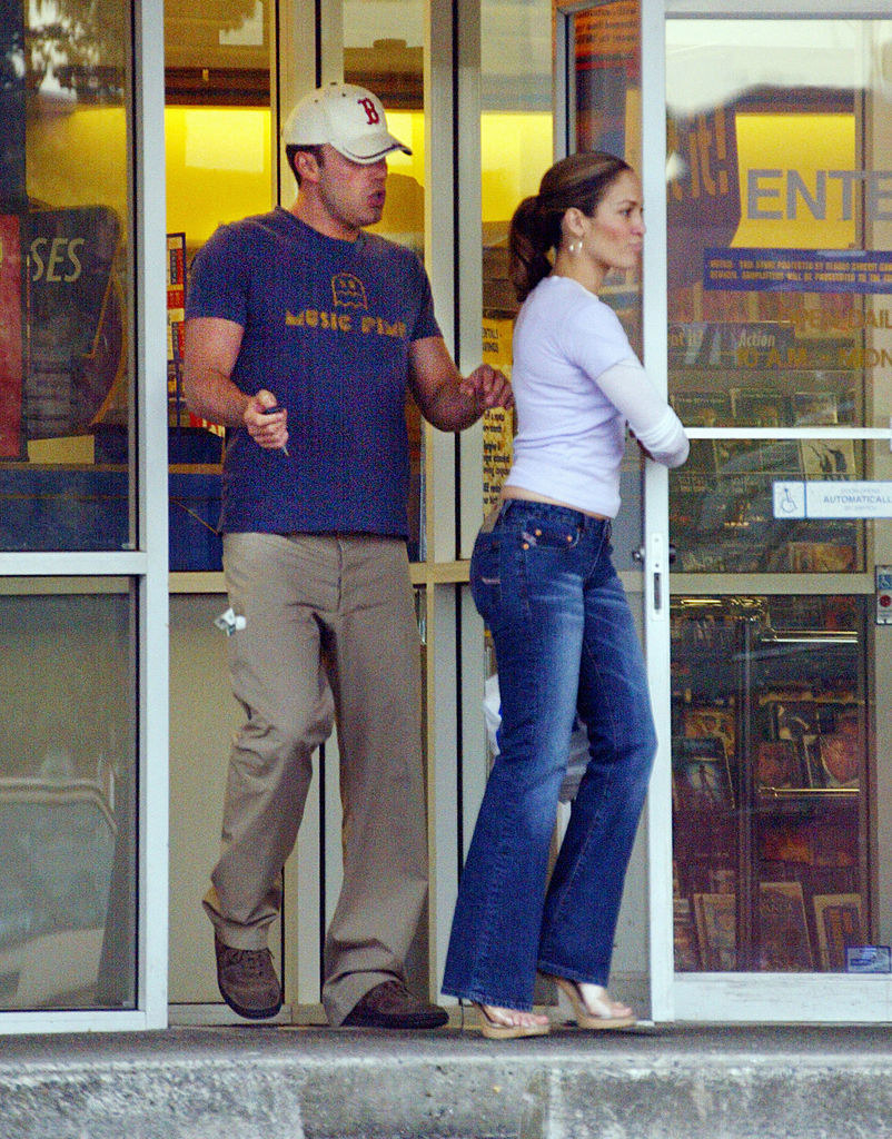 He&#x27;s wearing a Boston Red Sex cap and &quot;Music Pimp&quot; T-shirt and leaving the store with JLo