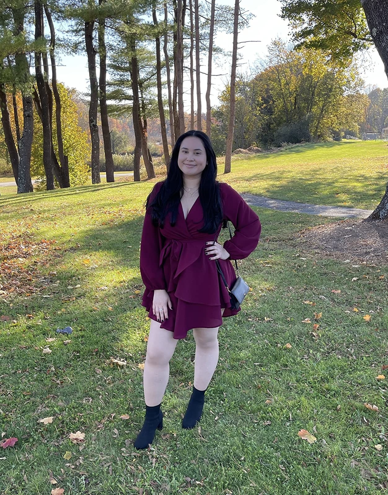Reviewer in the burgundy dress