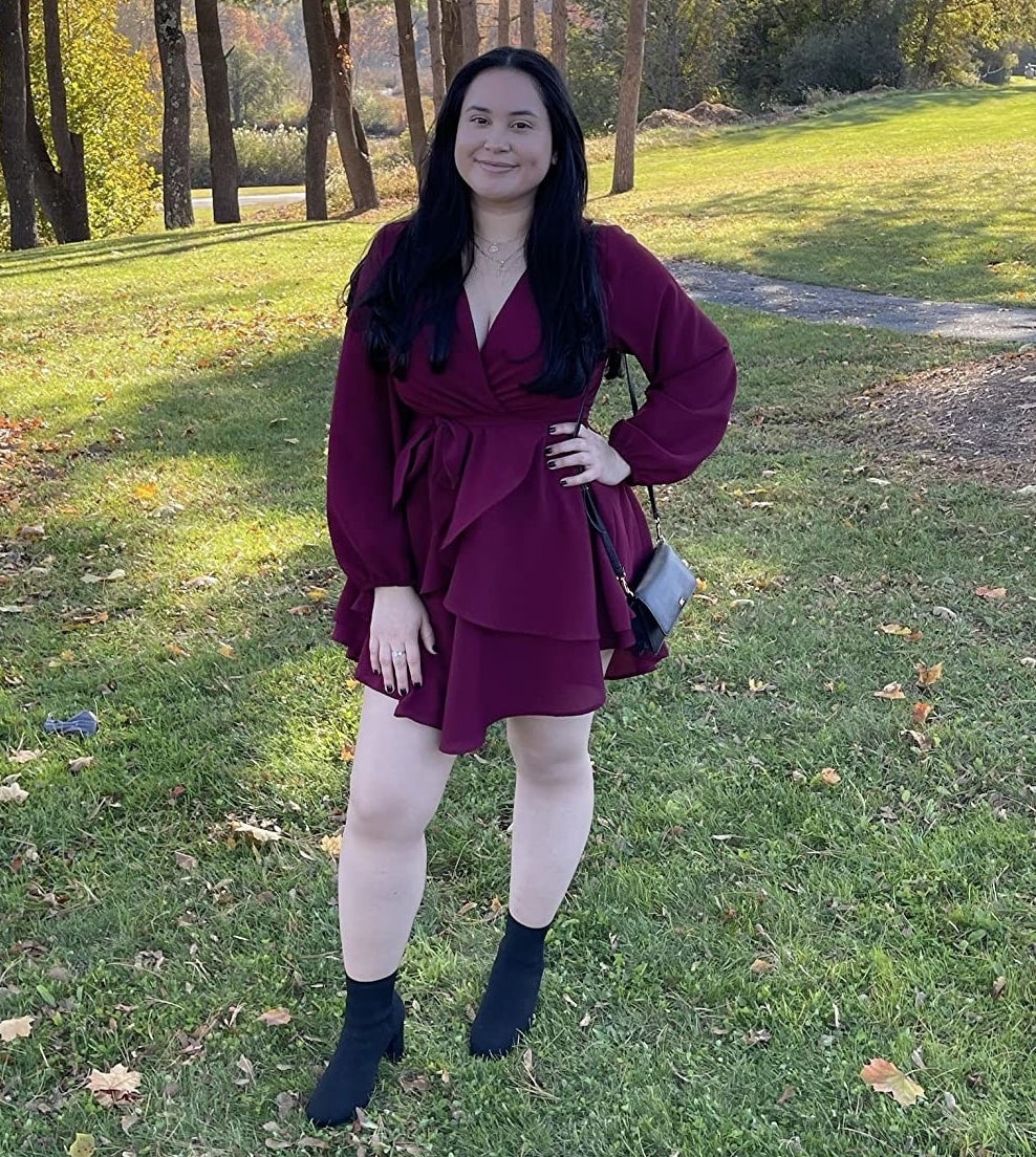 Reviewer in the burgundy dress