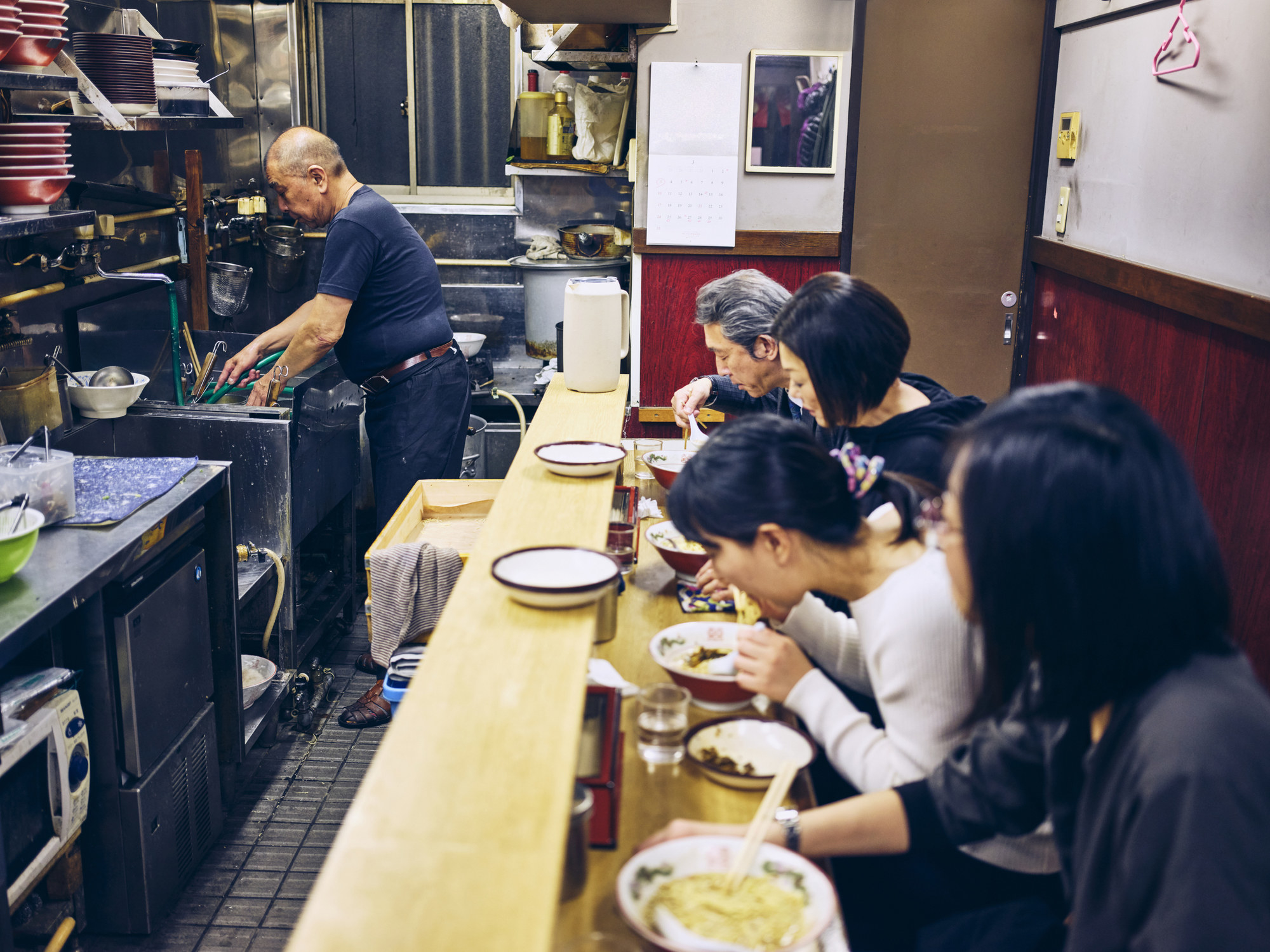 Customers at a ramen shop in Tokyo.