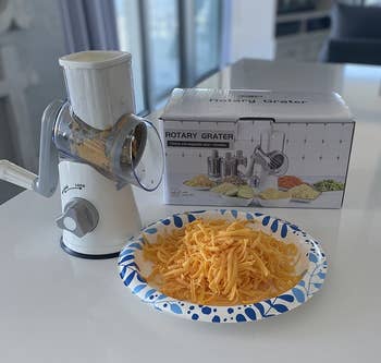 Reviewer's complete cheese grater set is shown