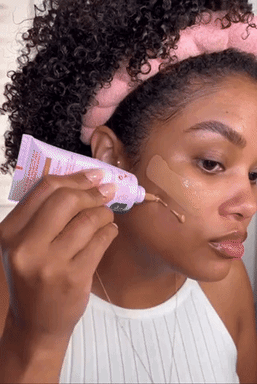 A gif of someone applying the foundation
