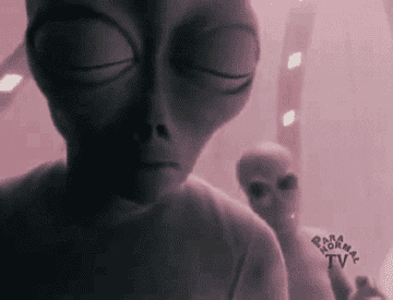 A GIF of two aliens