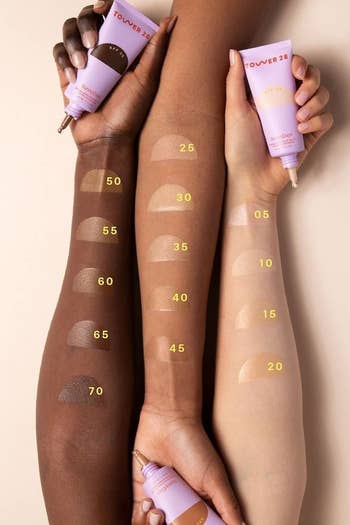 three models with swatch patches of each shade
