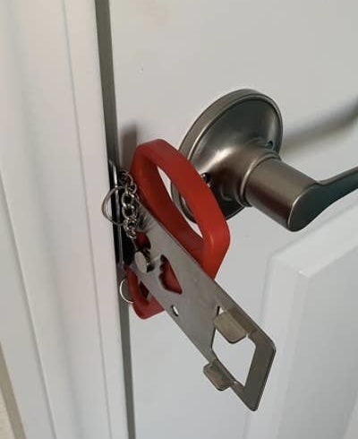reviewer&#x27;s manual lock in the crack of a door