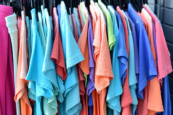 shirts on rack at discount store