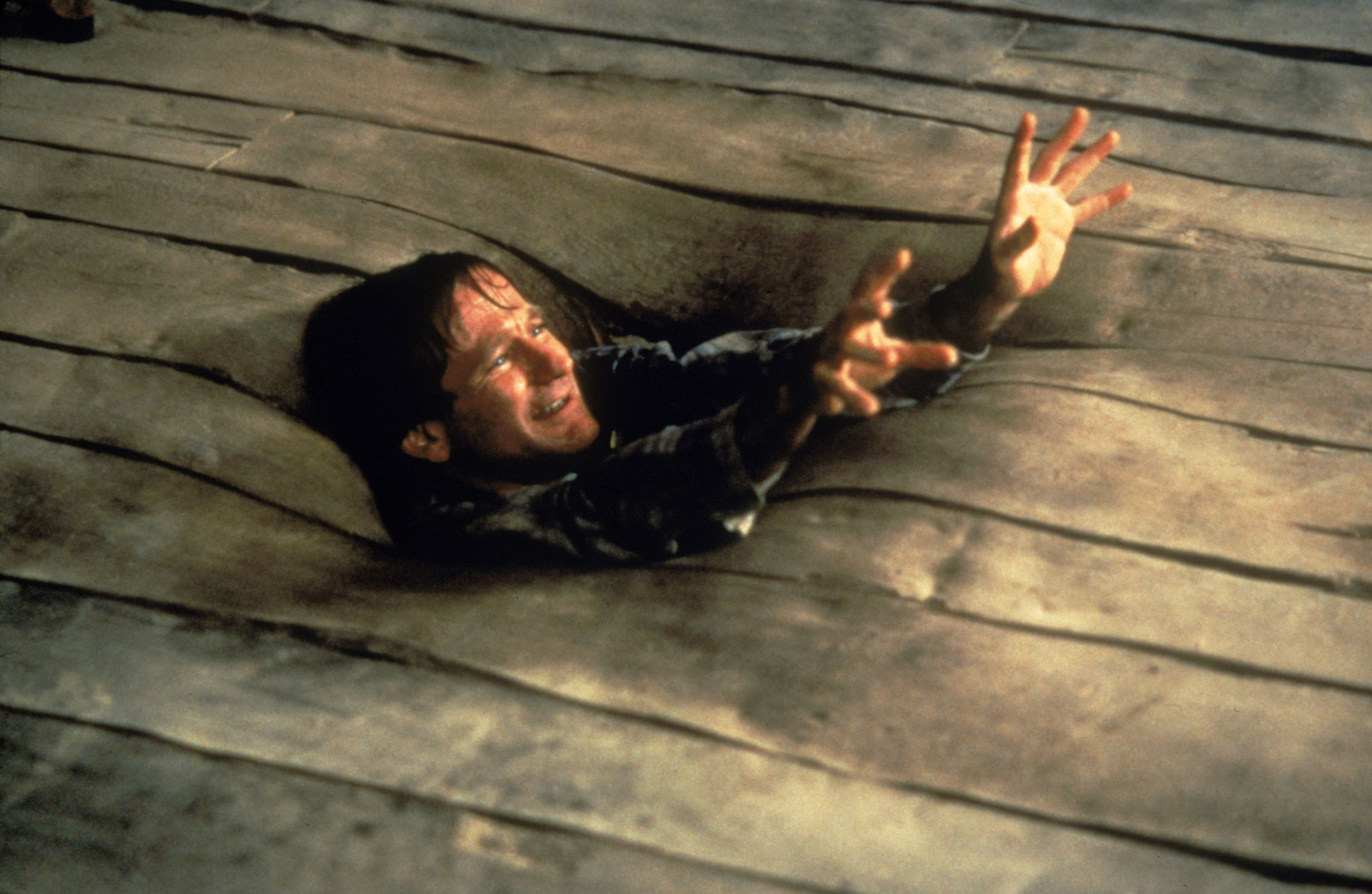 Robin Williams sinking into the floor