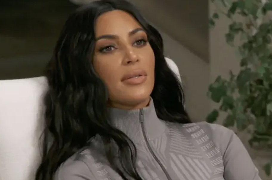Kim Kardashian leaning back and gazing at something