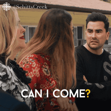 a gif of alexis from schitt&#x27;s creek saying &quot;can i come?&quot;