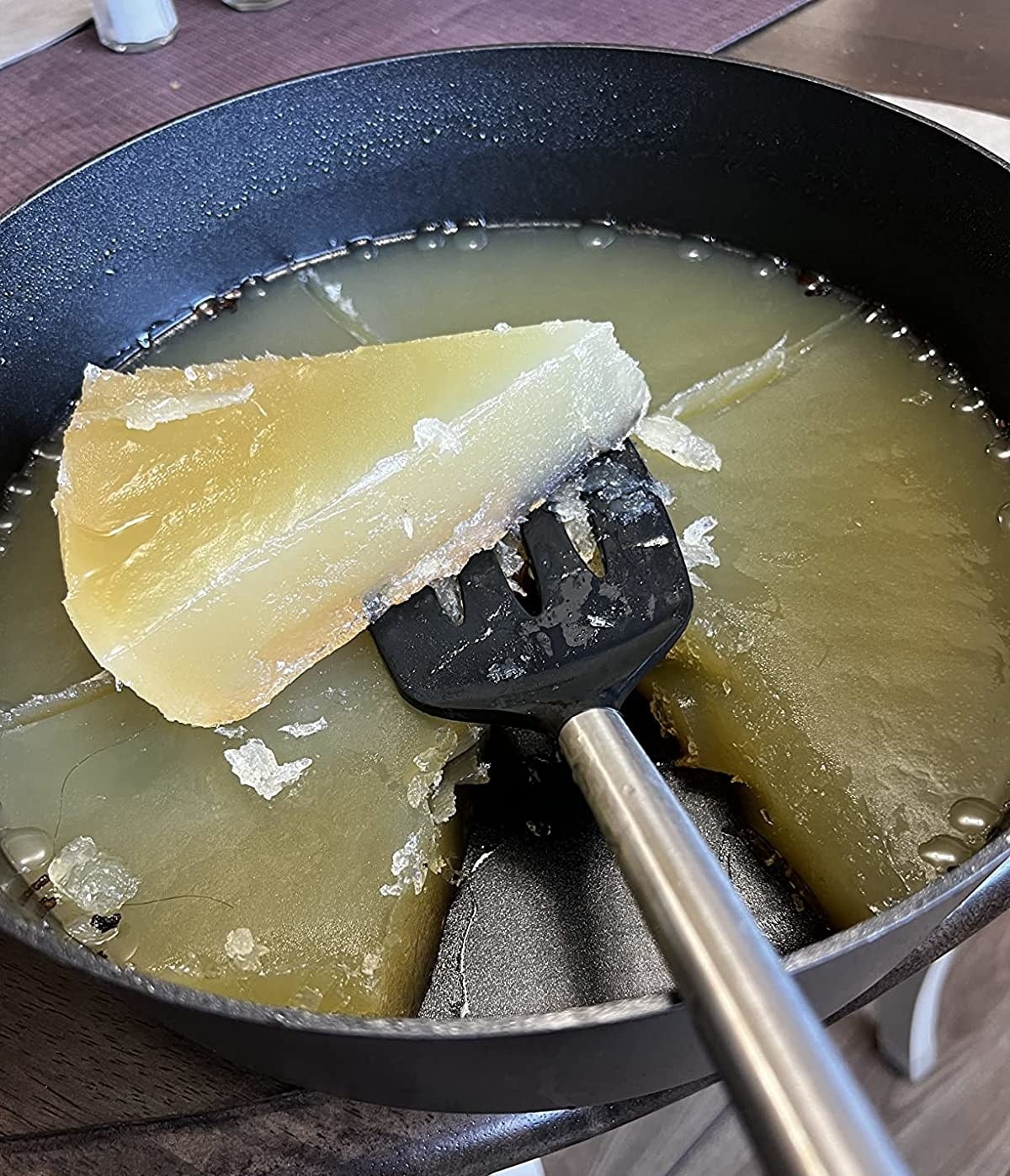 Reviewer image of solidified grease in a pan