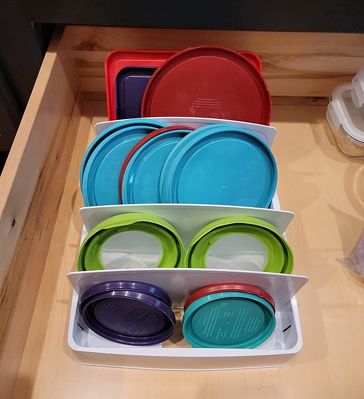 Reviewer image of Tupperware lids in organizer