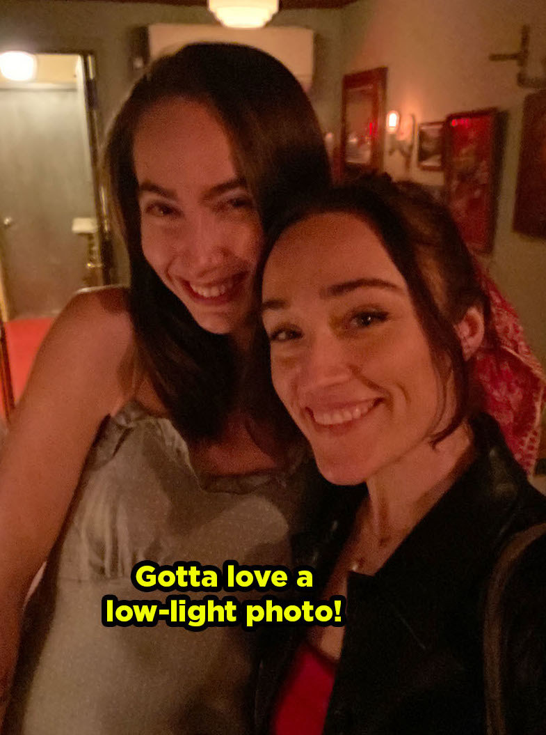 Two smiling women with caption, &quot;Gotta love a low-light photo!&quot;