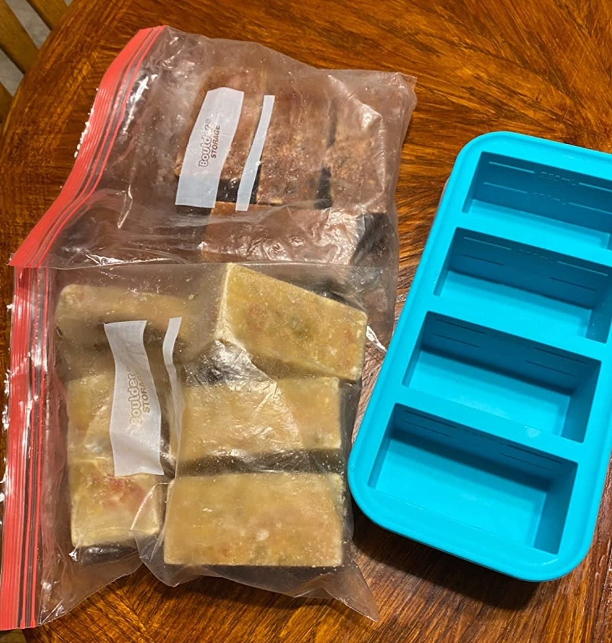 Reviewer image of freezer tray and bag of portioned frozen food