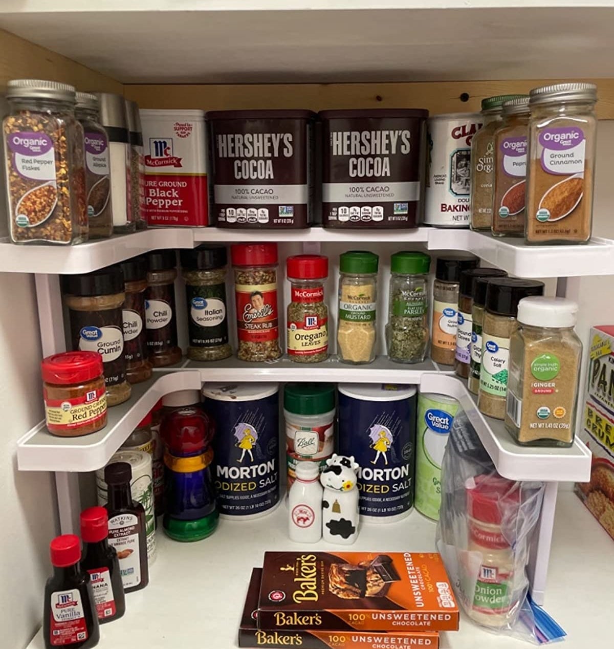 Reviewer image of spice rack filled with spices and pantry items on a shelf