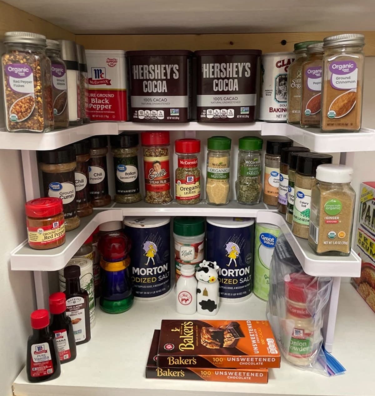 Reviewer image of spice rack filled with spices and pantry items on a shelf