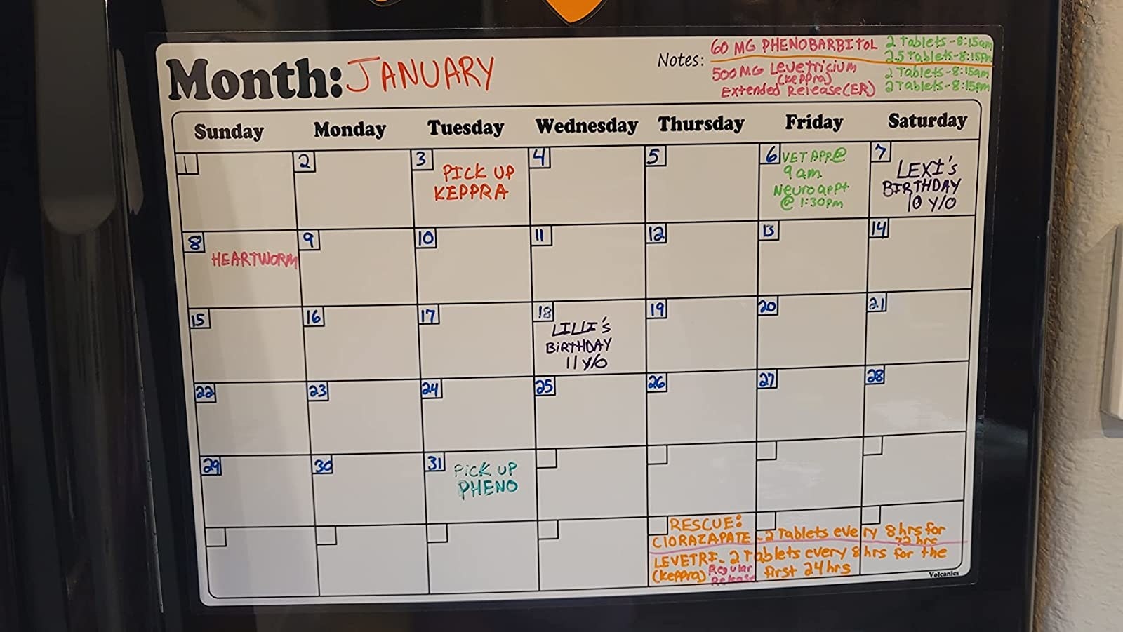 Reviewer image of the calendar on their fridge
