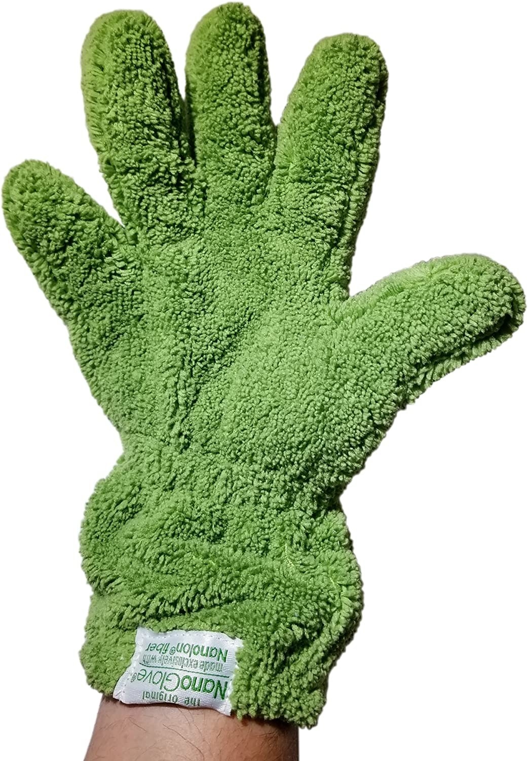 Person with green glove on their hand
