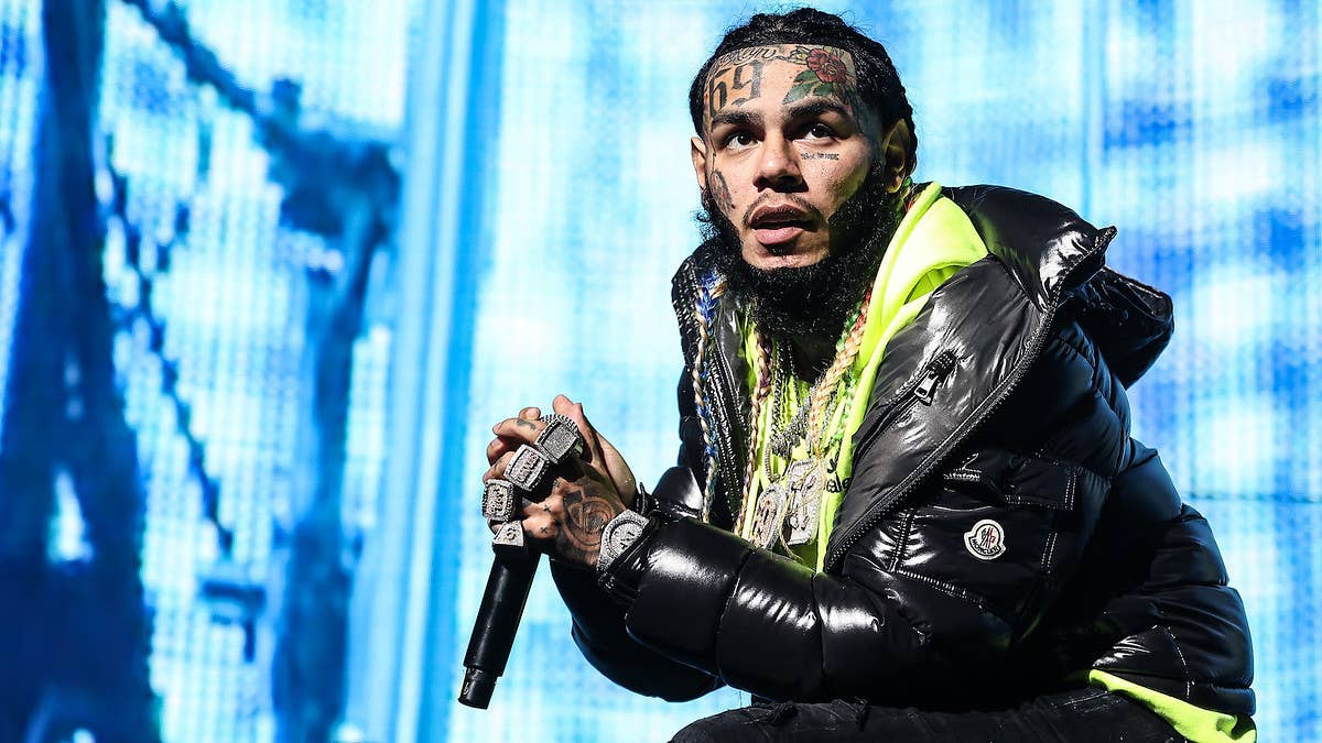 6ix9ine's bodyguard took to Instagram to challenge the men who ambushed the rapper at a Florida gym. "4 vs 1 y’all weak ass b*tches against me," he wrote.