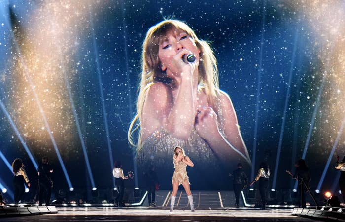 Taylor Swift singing during The Eras Tour opening night