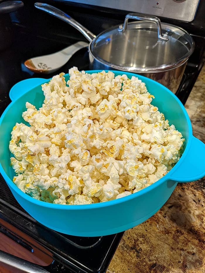 Reviewer image of popped popcorn in blue container