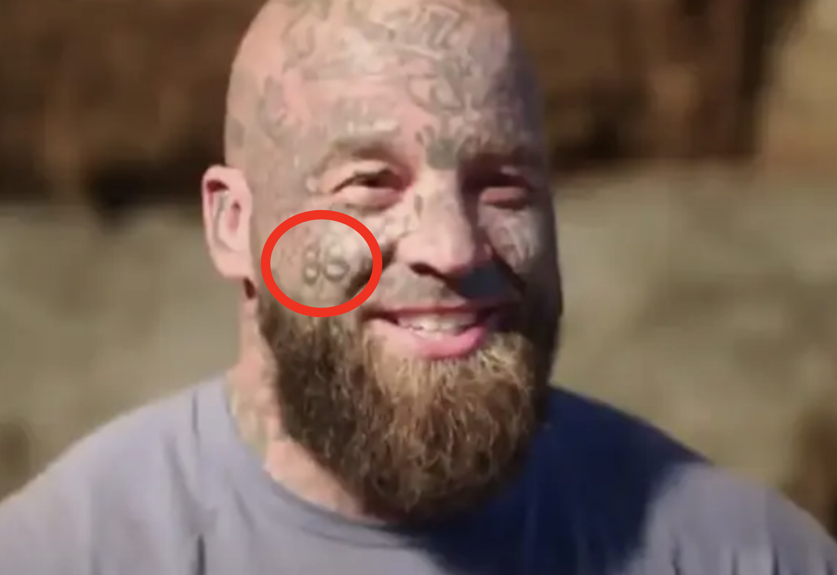 circle around the number 88 tattooed on someone&#x27;s face