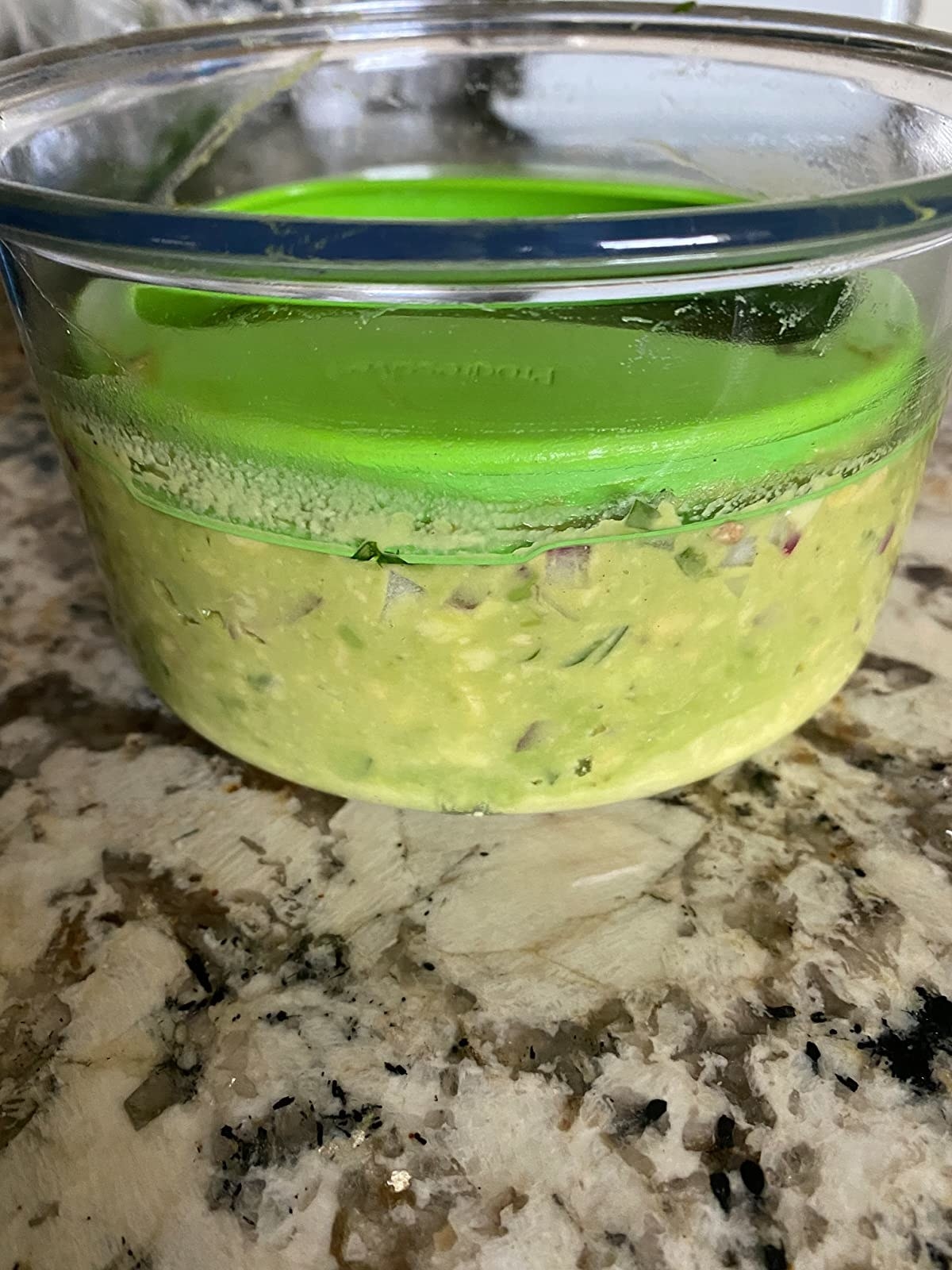 Reviewer image of guacamole in airtight container