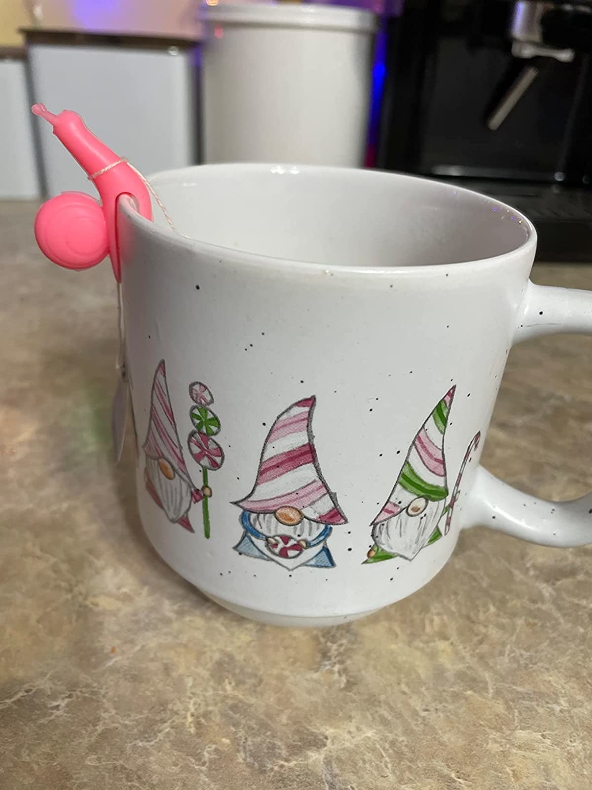 Reviewer image of pink snail teabag holder on a gnome mug