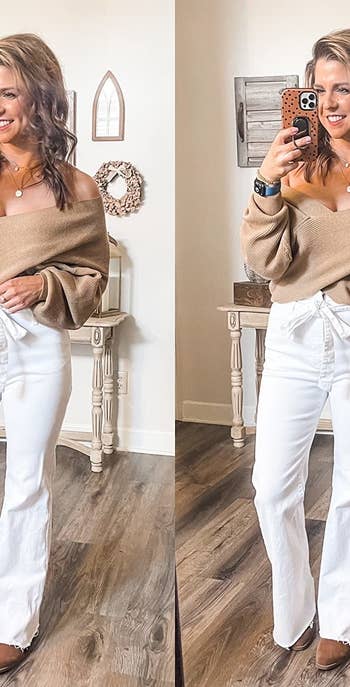 a reviewer wearing a brown top with white pants