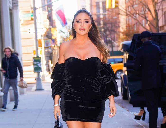 Larsa walking outside