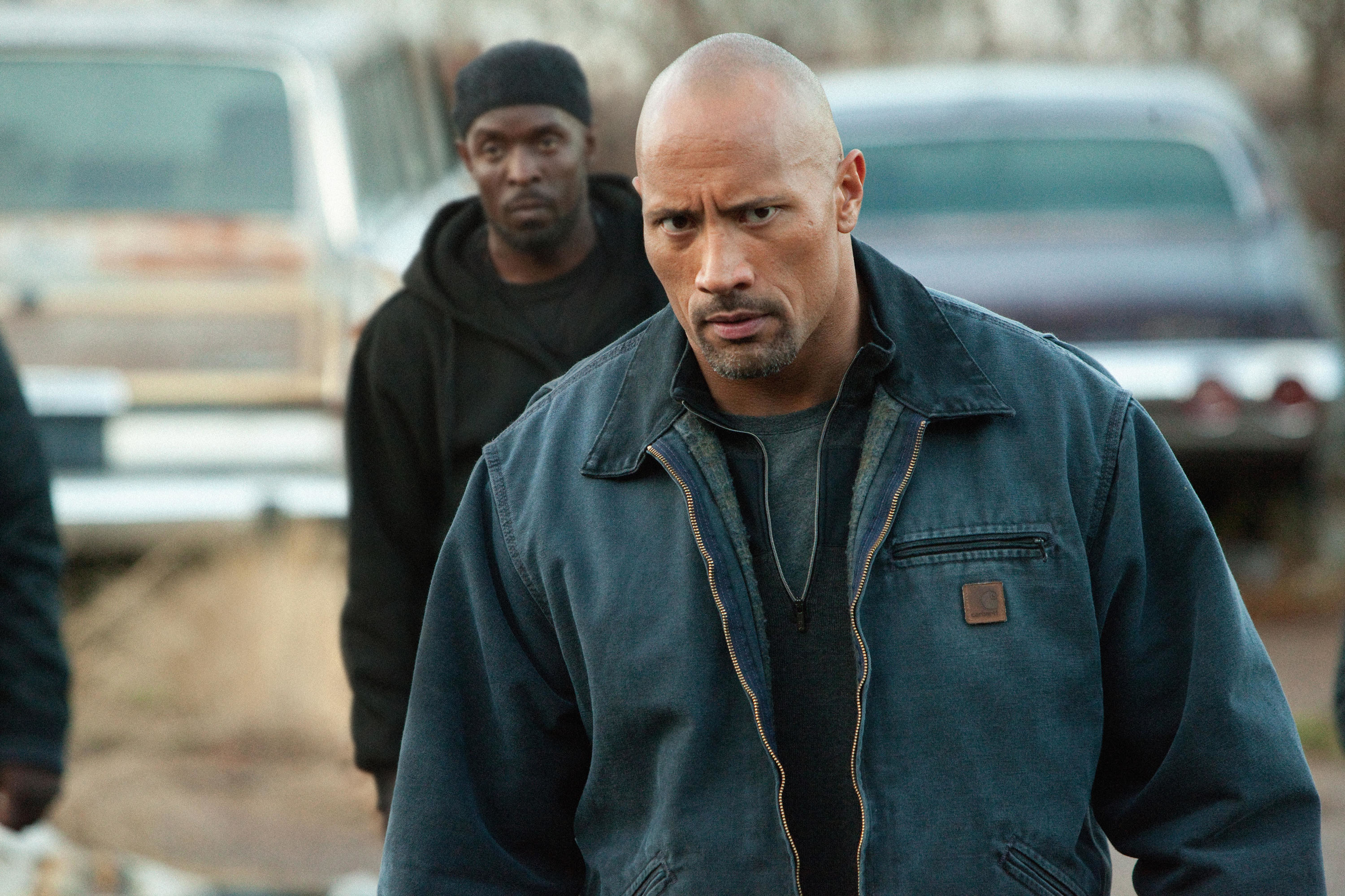Dwayne Johnson storms off with Michael K. Williams shortly behind him