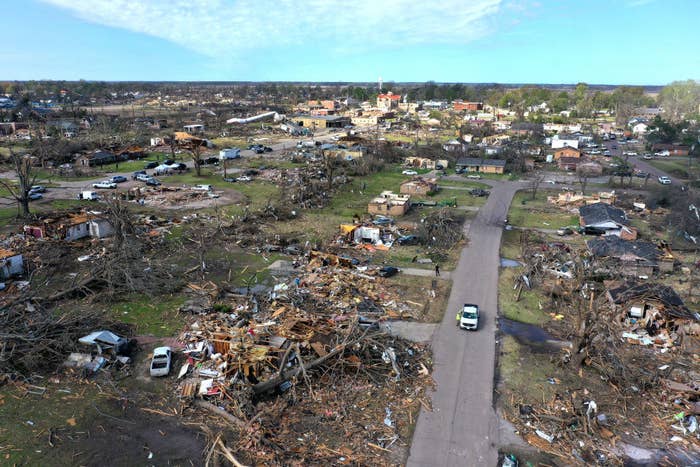In an aerial view, piles of debris remain where homes once stood before Friday&#x27;s EF-4 tornado