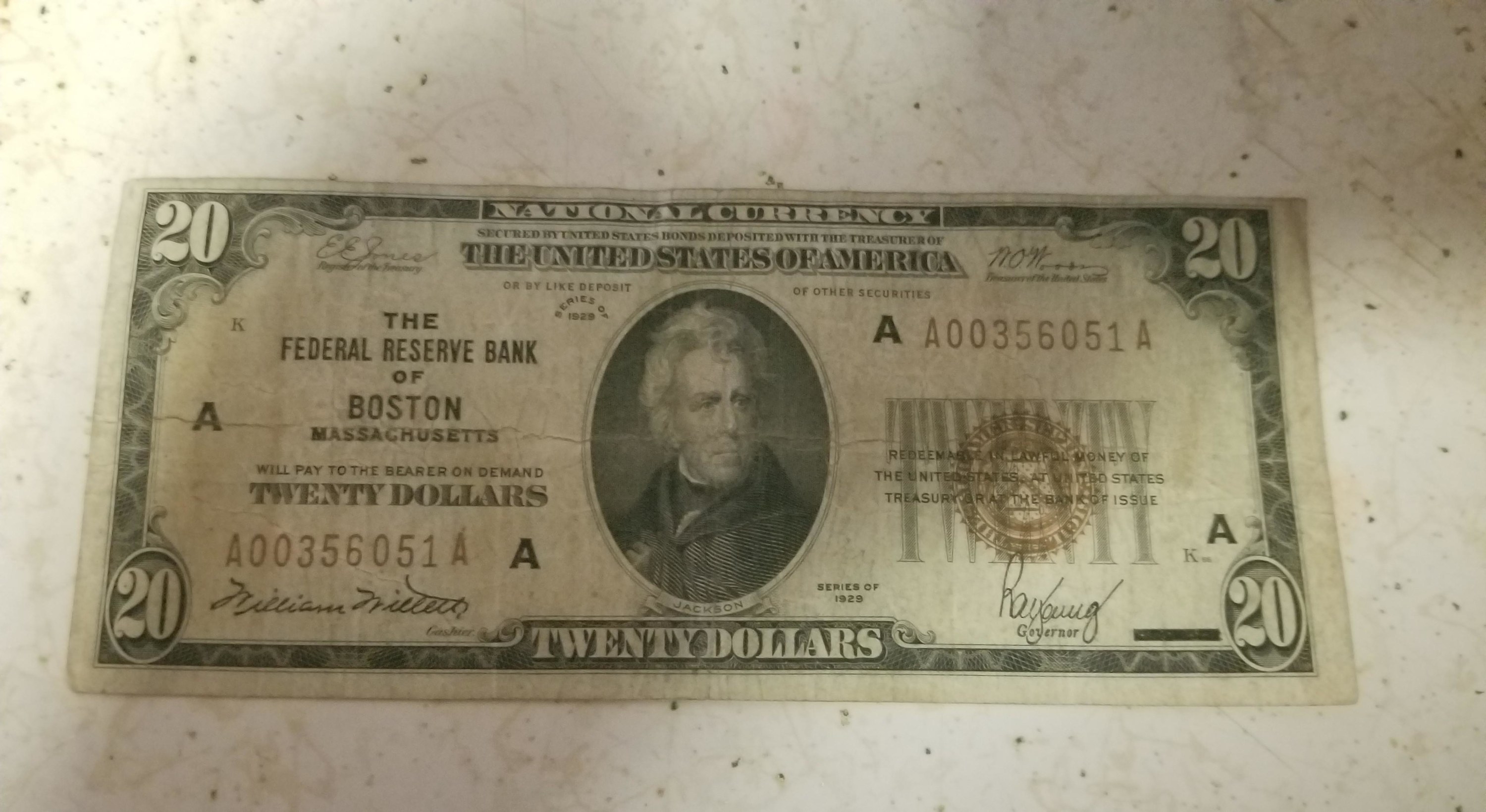 The &quot;20&quot; is smaller, Andrew Jackson&#x27;s portrait is in a circular frame, and &quot;Twenty dollars&quot; and &quot;The United States of America&quot; are in the center, among other differences