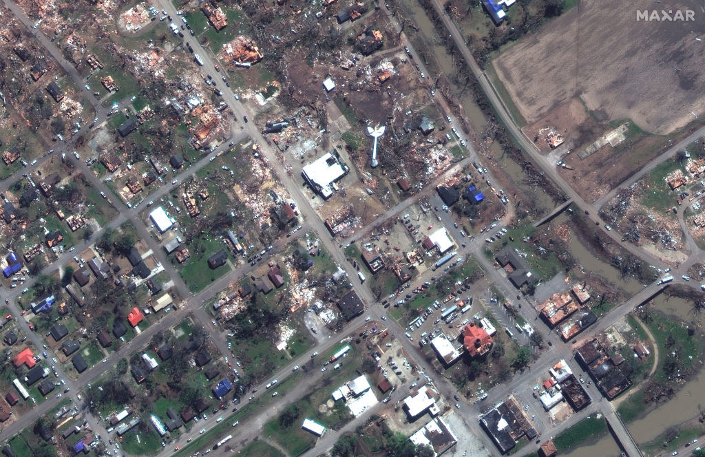That same overhead shot, with many of the houses now completely gone and a ton of debris everywhere