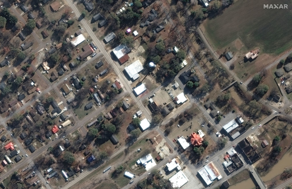 An overhead shot of a neighborhood with many houses in close proximity to each other