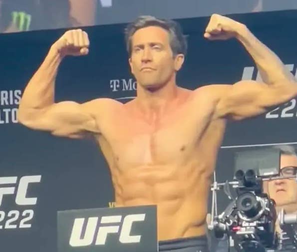 Jake Gyllenhaal flexes at a UFC weigh-in as he films a movie scene