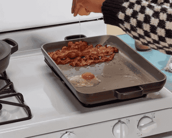 A gif of the gray pan being used as a griddle