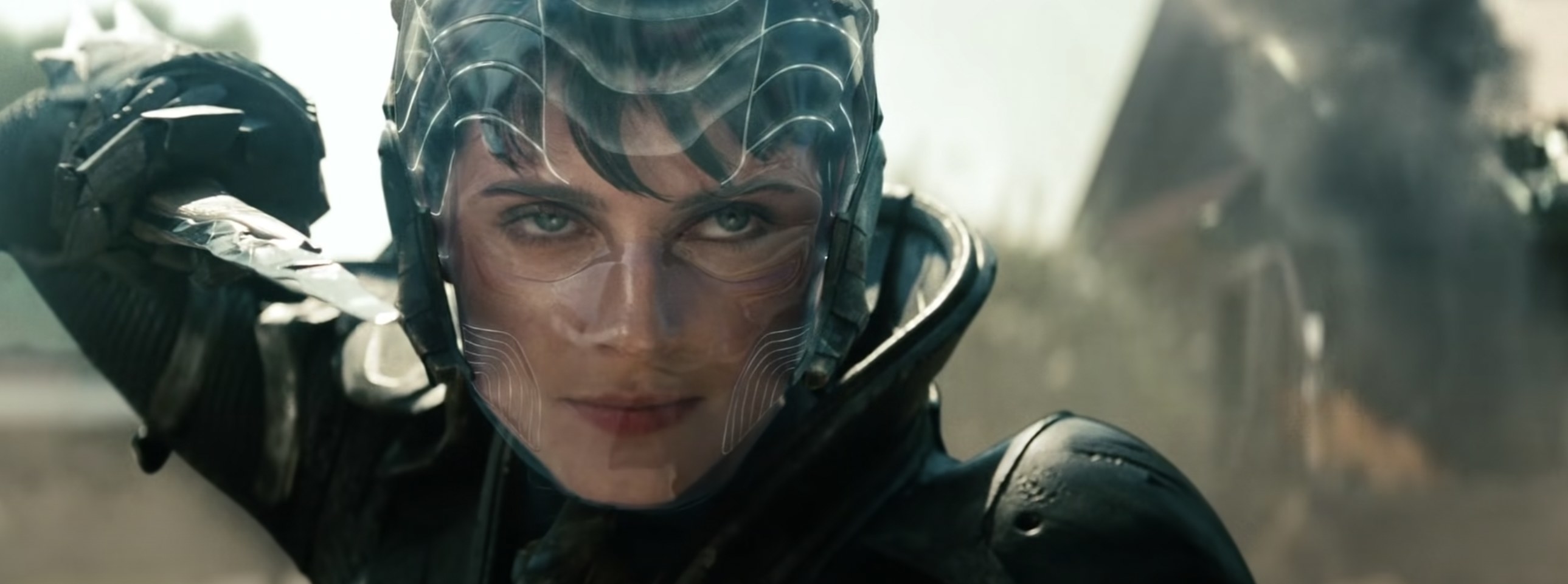 Faora-Ul holds a blade and smiles