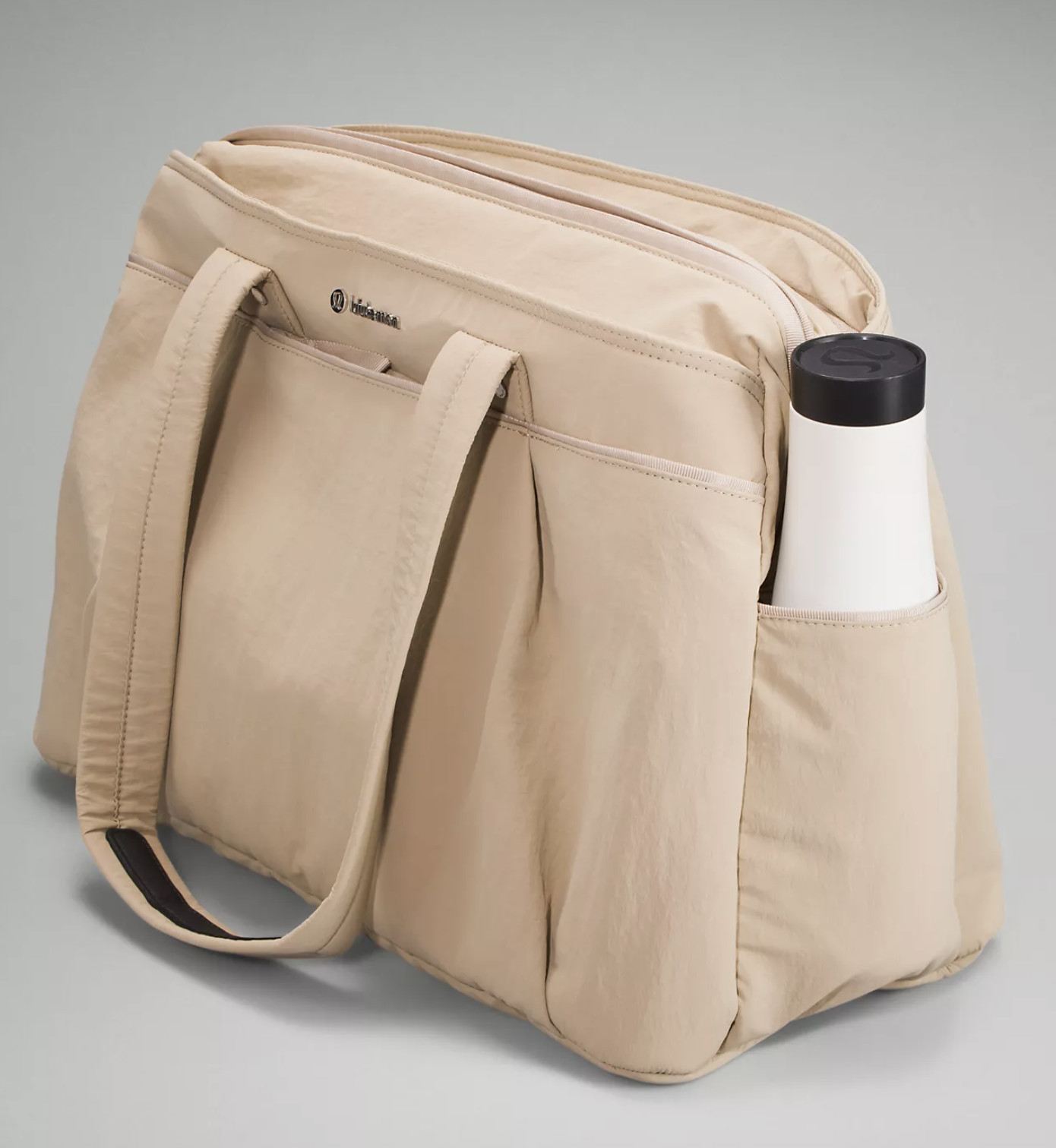 The bag with a water bottle in the pocket