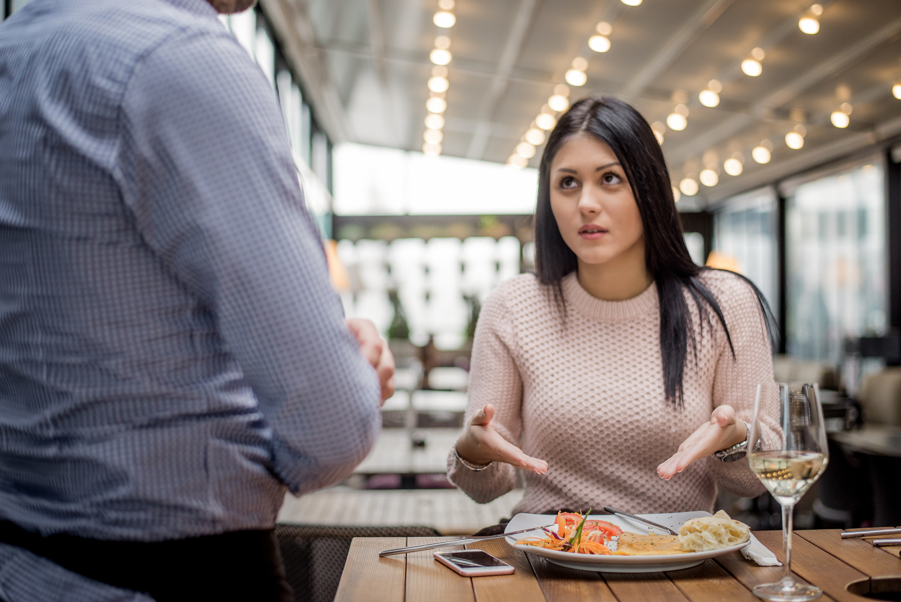 Woman unhappy with her meal