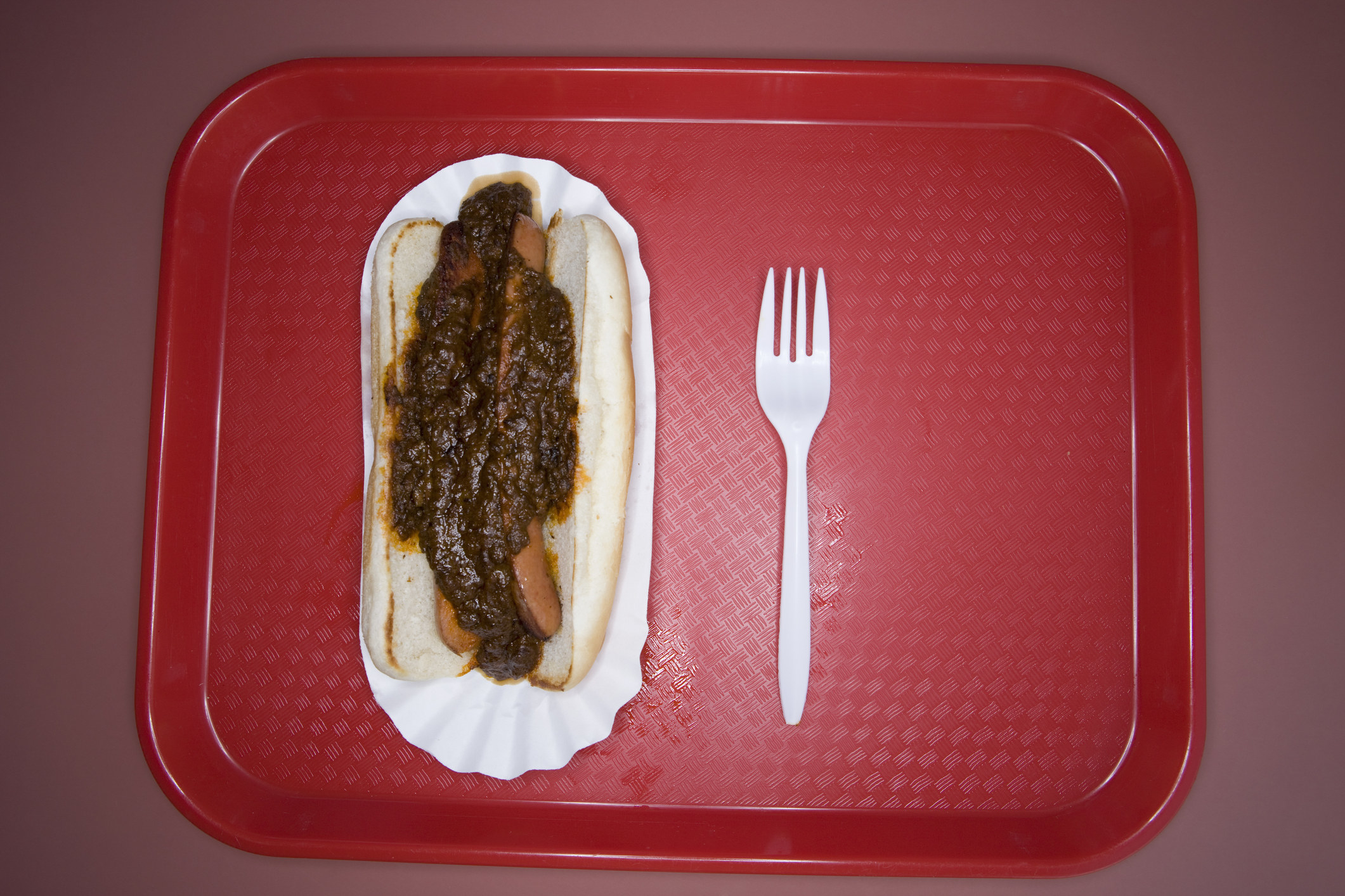 A hot dog on a tray
