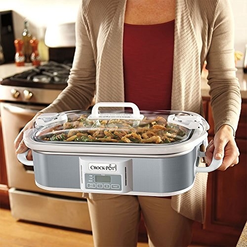 Model holding the slow cooker