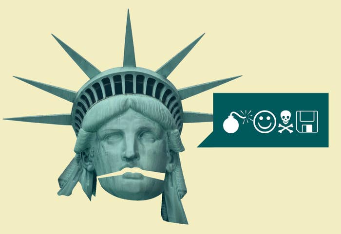 The statue of liberty&#x27;s head with the mouth open and a speech bubble with symbols for a bomb, a smiley face, skull and crossbones, and a floppy disk