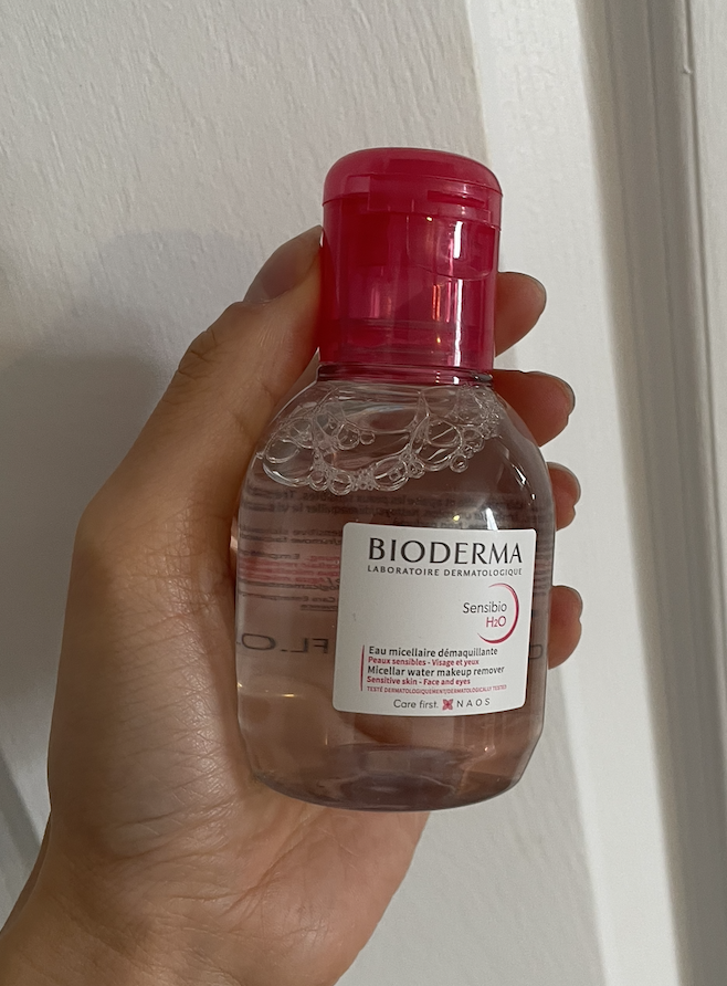 May holding the bottle of micellar water