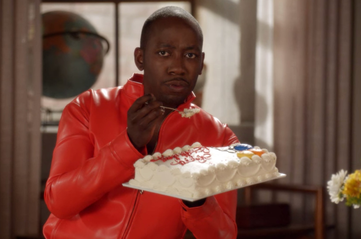 Winston from New Girl eating a whole birthday cake