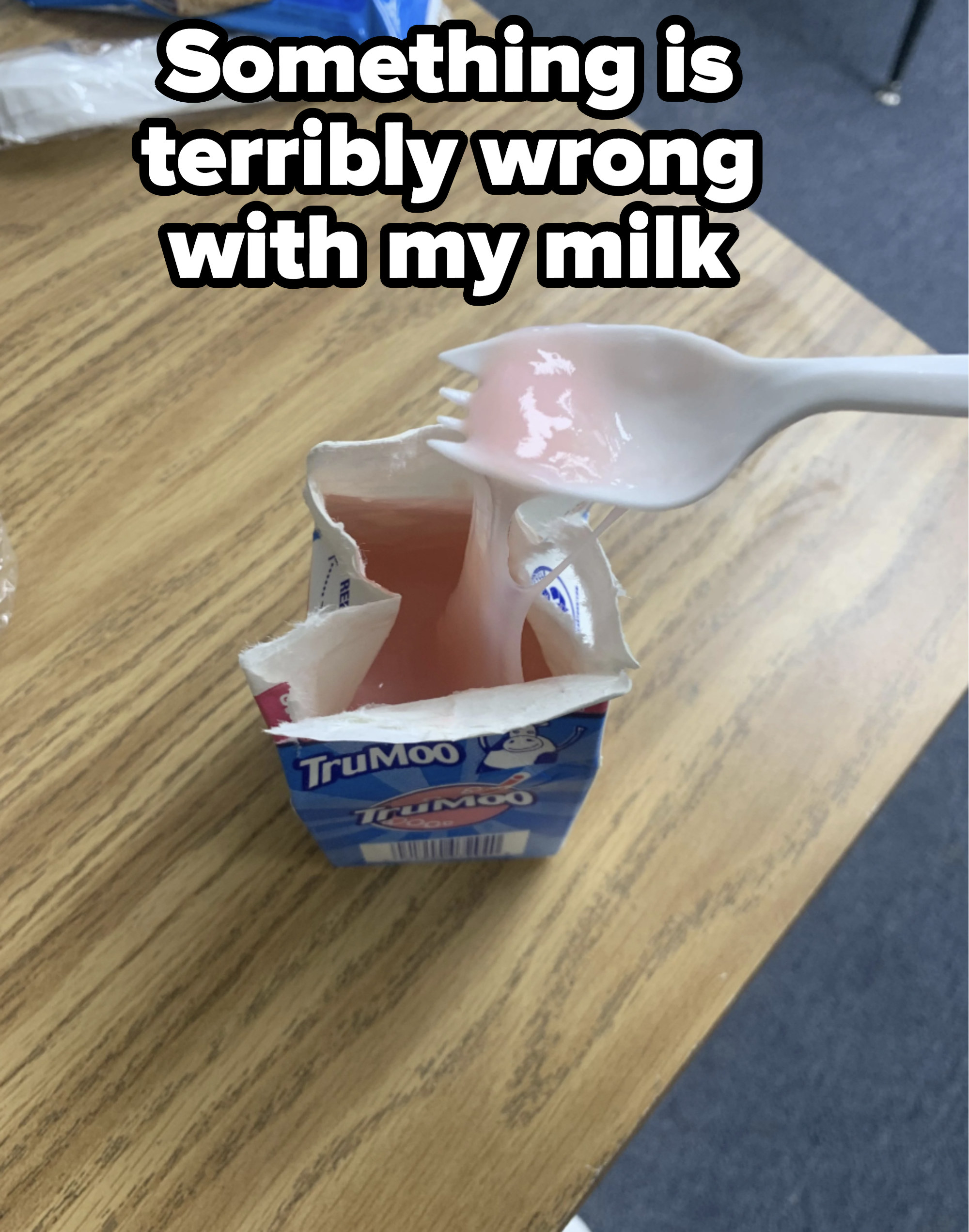 Milk that has turned pink and goopy