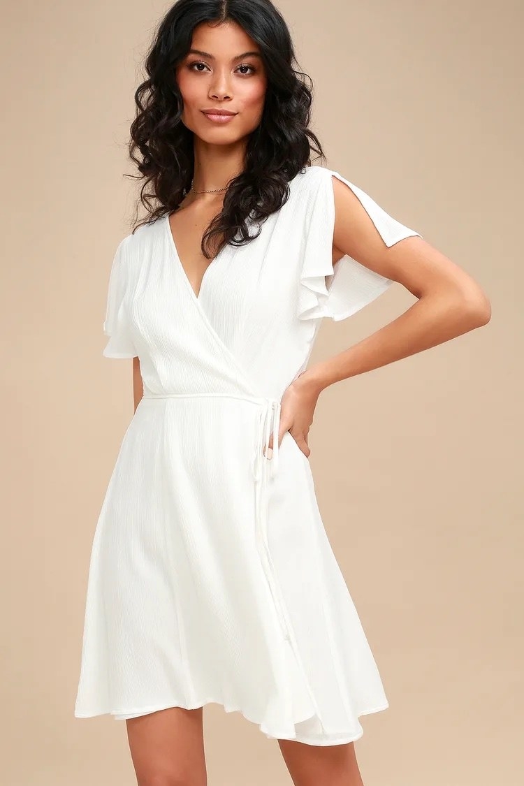 Model wearing white dress