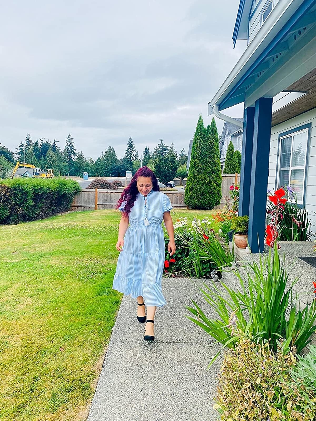 blue and white dress with black shoes Oslo Edition